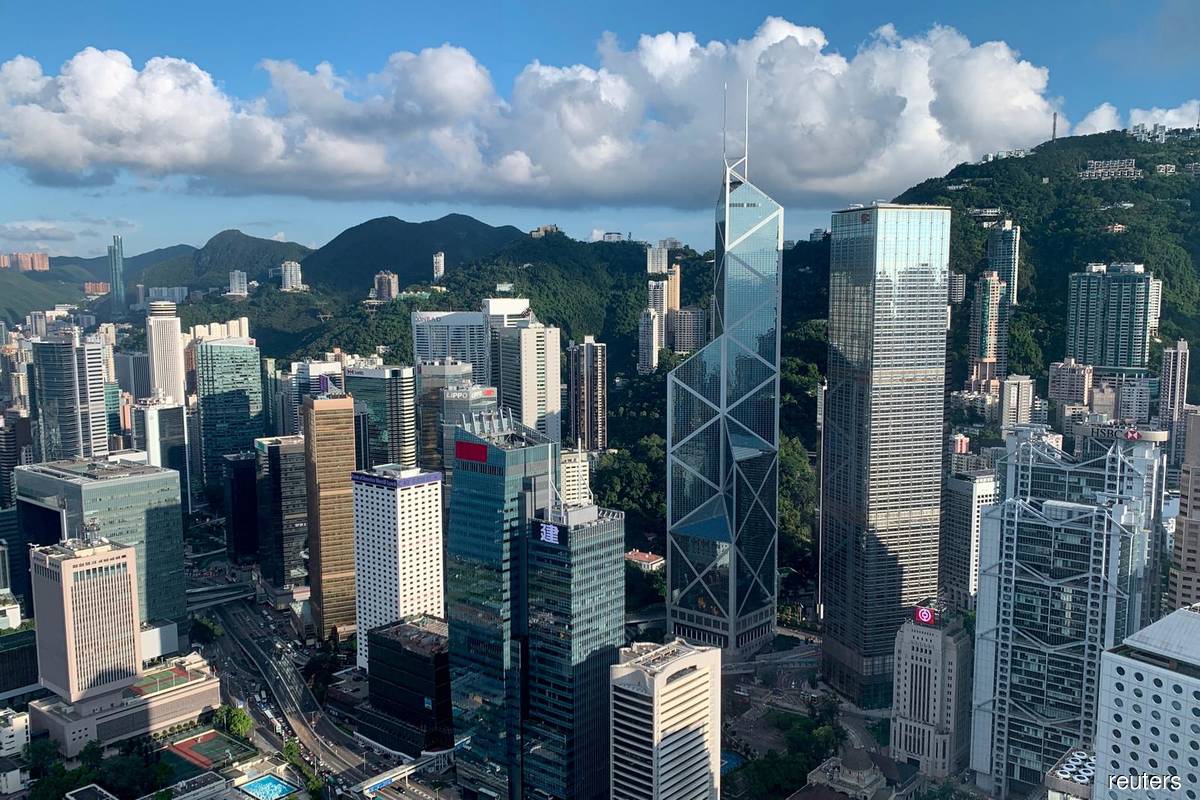 Chinese firms are dominating key parts of Hong Kong’s economy
